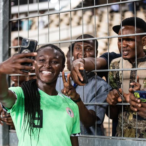 England-born star Rinsola Babajide celebrates Super Falcons of Nigeria victory against South Africa with fans.