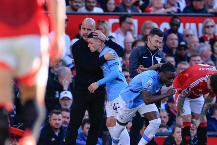 Manchester United, ManU v Manchester City Premier League 06 04 2025. Pep Guardiola the Manchester City manager embraces Phil Foden (47) of Manchester City who is substituted during the Premier League match || Image credit: Imago