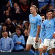 Kyle Walker, Phil Foden and Erling Haaland celebrate Manchester City goal.
