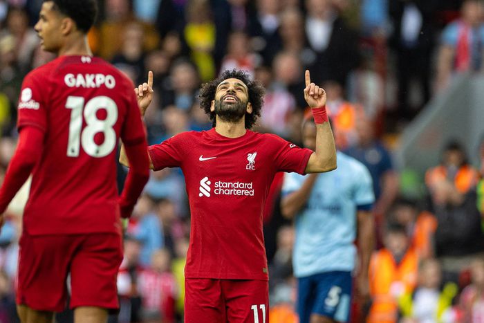 Mohamed Salah celebrates his 100th goal for Liverpool at Anfield.