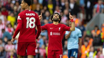 Salah’s record goal sends Liverpool to a point off Manchester United