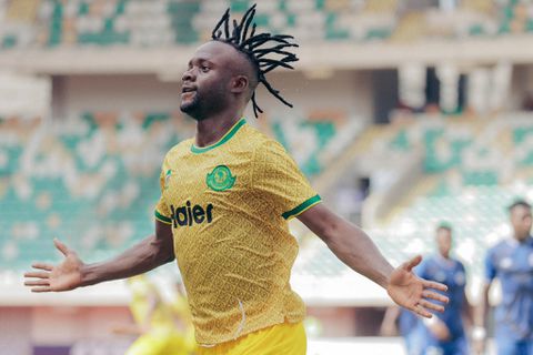 Mayele models new Young Africans kit to allay exit fears