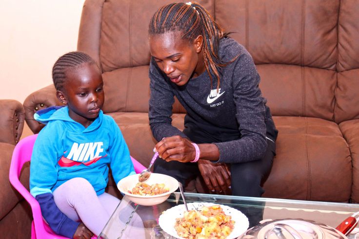 Faith Kipyegon and her daughter Alyn