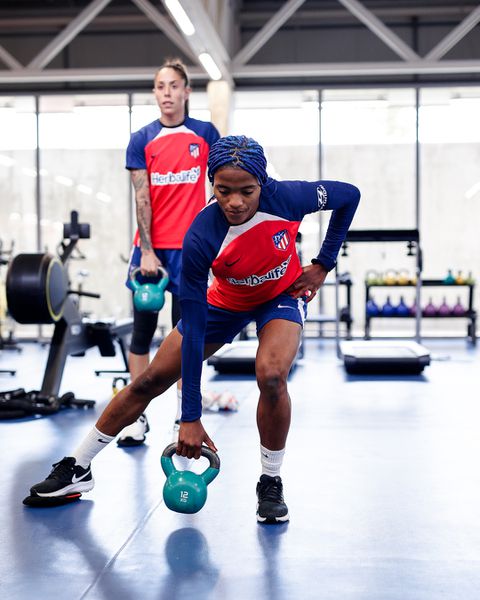 Ajibade had short blue hair that stood out right away in her new pictures but has now gone blue braids Image Credit - Instagram/Atletico Madrid