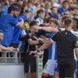 WATCH: Ex-Arsenal player grabs throat of young fan