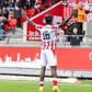 Kenyan midfielder Richard Odada celebrates a goal for his Danish club Aalborg.