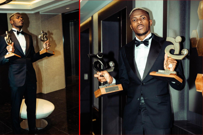 Victor Osimhen posing with his AIC Player of the Year awards || Image credit: IG