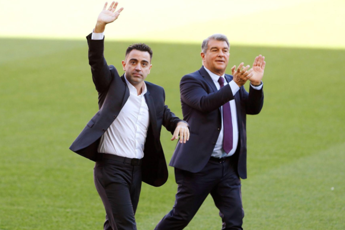 Xavi Hernandez and Joan Laporta