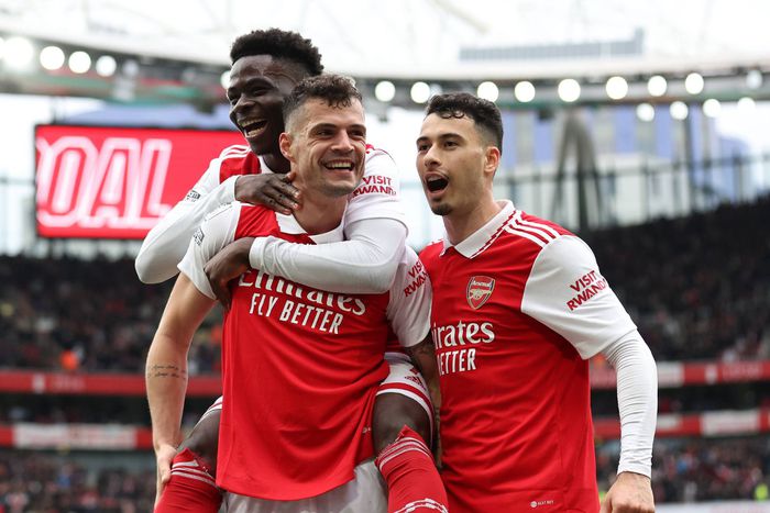 Granit Xhaka and Bukayo Saka celebrate Arsenal goal at Emirates.