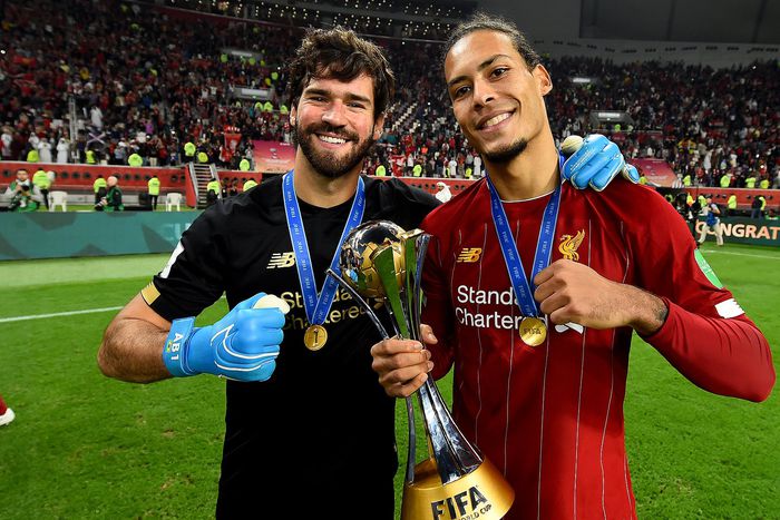 Liverpool's Van Dijk and Alisson Becker