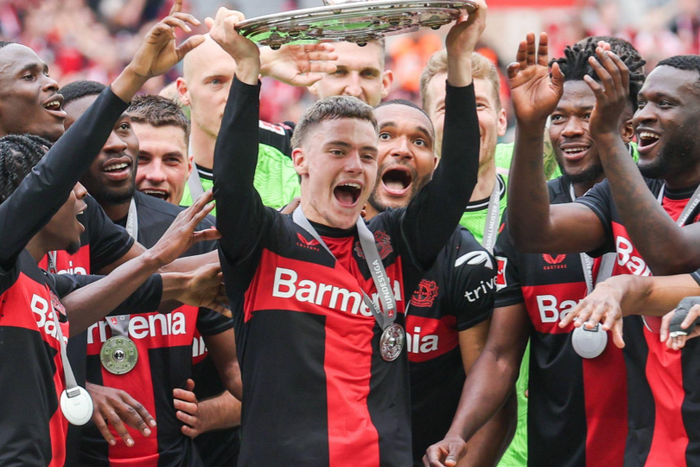 Bayer Leverkusen players celebrating with the Meisterchale || Image credit: Imago