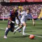 Lamine Yamal of FC Barcelona controls the ball while defended by Arda Guler of Real Madrid || Image credit: Imago