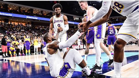 In an NBA pre-season game, LeBron James and his son Bronny made history as the Lakers lost to the Suns.