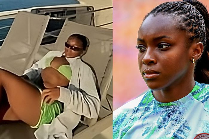 In the photo, Alozie is lying down on a yacht with her curves on display in the green bikini.