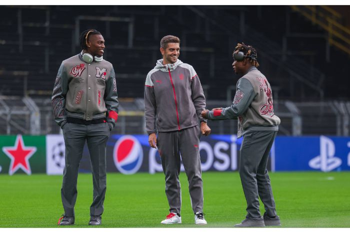 Chukwueze and Leao celebrating Milan's win