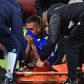 Iwobi was stretchered off after sustaining an injury against Manchester United