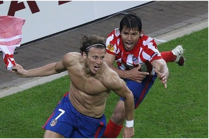 Diego Forlan and Kun Aguero celebrate for Atletico Madrid.