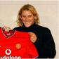 Sir Alex Ferguson (left) and Diego Forlan in 2002.