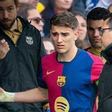 Late Barcelona first-team coach Carles Minarro Garcia attending to an injured Gavi || Image credit: Imago