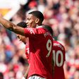 Manchester United's Marcus Rashford and Anthony Martial celebrate goal vs Everton.