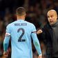 Manchester City right-back Kyle Walker with manager Pep Guardiola