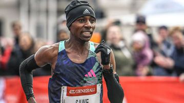 Sabastian Sawe reacts after shattering course record at Prague Half Marathon