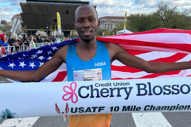 Kenyan-born Hillary Bor reacts to setting new American 10-mile record