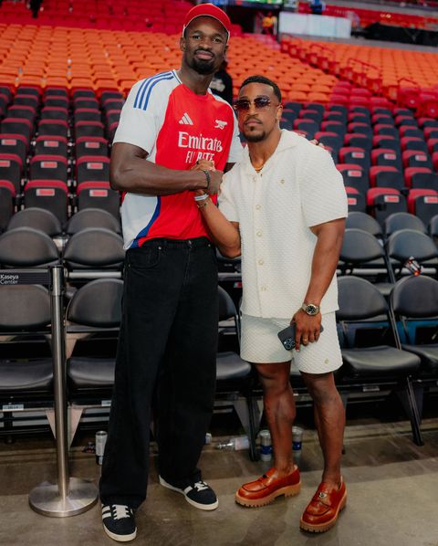 Nigerian NBA Star Adem Bona Okoro Teams Up with Fitness Influencer Ashton Hall at Miami Heat win against Philadelphia 76ers.