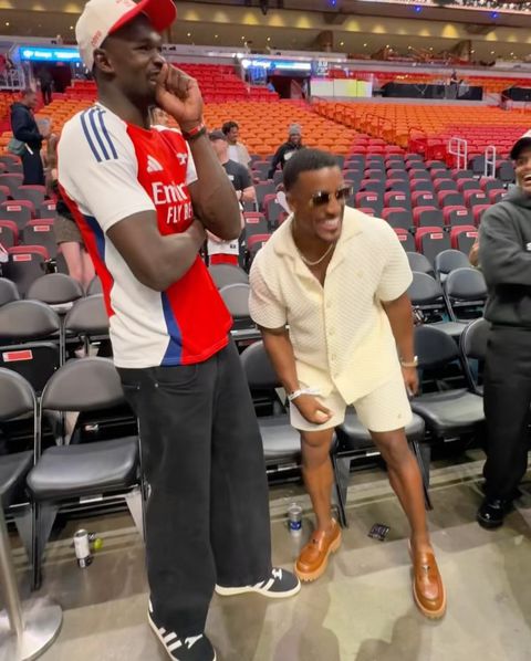 Nigerian NBA Star Adem Bona Okoro Teams Up with Fitness Influencer Ashton Hall at Miami Heat win against Philadelphia 76ers.