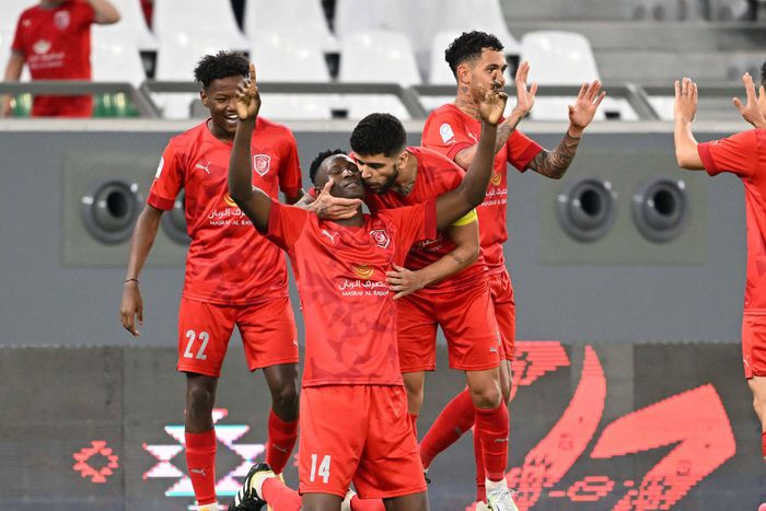 Al Duhail's Micahel Olunga celebrates goal with teammates.