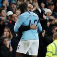 Pep Guardiola and Yaya Toure in an embrace.