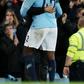 Pep Guardiola and Yaya Toure in an embrace.