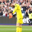 Manchester United goalkeeper David De Gea reacts after conceding a goal.