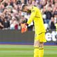 Manchester United goalkeeper David De Gea reacts after conceding a goal.