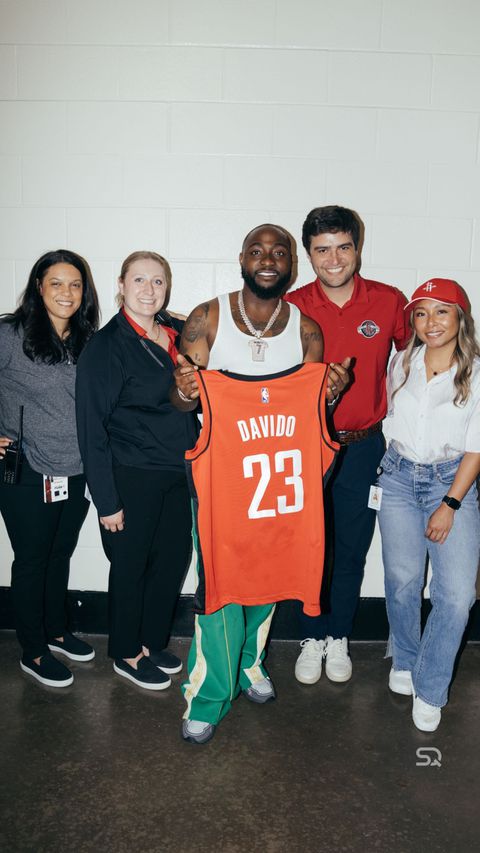 Davido took to social media to show off a Houston Rockets jersey he received after performing at the arena.