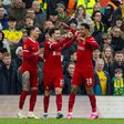 Liverpool s Curtis Jones (C) celebrates with team-mates Darwin Nunez (L) and Cody Gakpo (R) after scoring the first goal during the FA Cup 4th Round match between Liverpool FC and Norwich City FC at Anfield. (Photo by David Rawcliffe Propaganda)