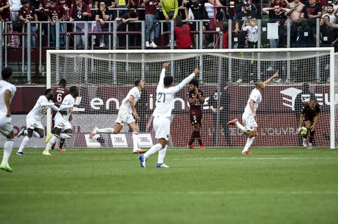 Bottles thrown, match held-up as Marseille fight back