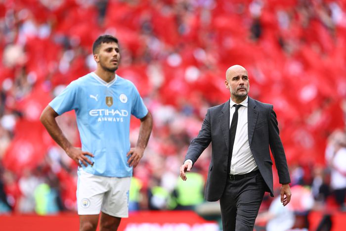 Rodri and Pep Guardiola