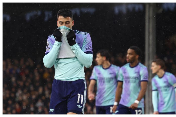 Arsenal drop vital point in title race