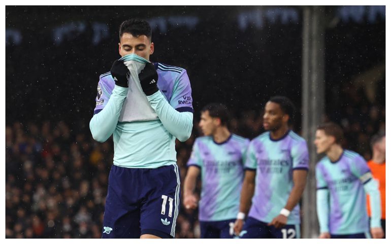 Arsenal drop vital point in title race