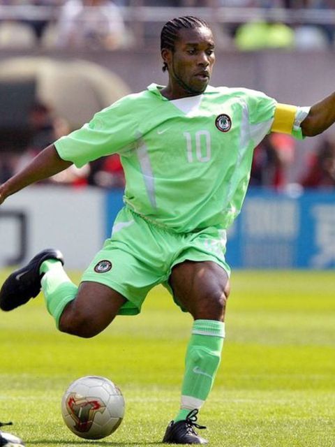 Jay Jay Okocha in full flight during his playing days for Nigeria.