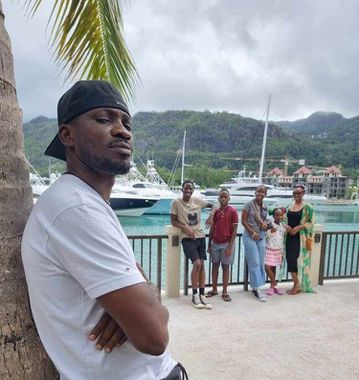 Impossible is nothing, you'll raise the national flag' - Bobi Wine tells son Solomon Kampala