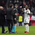 Diego Simeone engaged in an argument with Real Madrid's Vinicius || Image credit: Imago