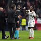 Diego Simeone engaged in an argument with Real Madrid's Vinicius || Image credit: Imago