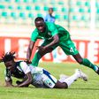 Gor Mahia Paul Ochuoga (top) tussle for the ball against KCB Erick Adem on January 4th 2023