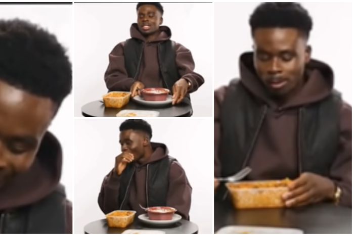 Bukayo Saka enjoys jollof rice at snack wars.