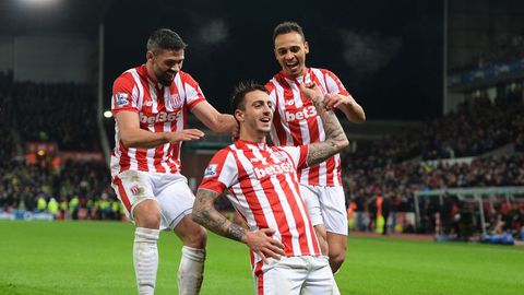 Joselu and Jonathan Walters celebrating a goal with Nigeria's Osaze Odemwingie | Imago