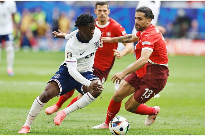 Kobbie Mainoo on the move against Switzerland at the EURO 2024.
