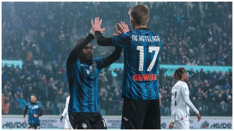 Lookman celebrates a huge win with his Atalanta teammates.