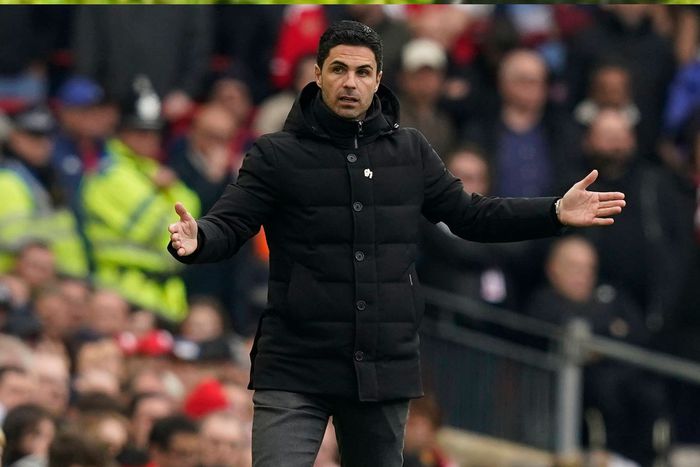 Mikel Arteta gestures at Anfield during Arsenal vs Liverpool match.